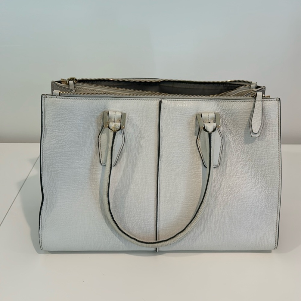 Tod’s white and grey tote handbag.